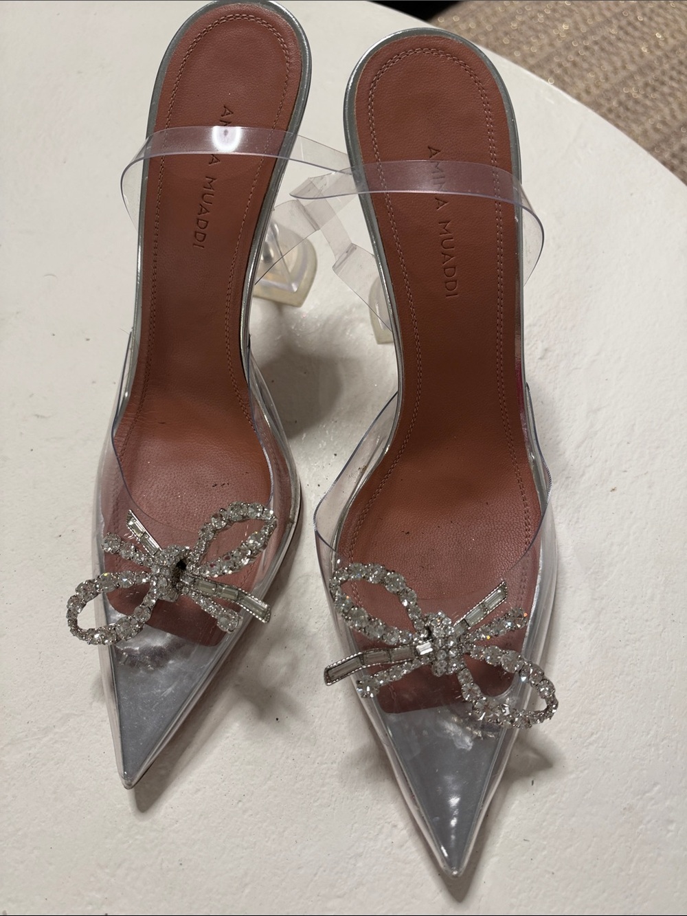 Amina Muaddi Clear PVC Pointed-Toe Mules with Crystal Bow - Brown Insole